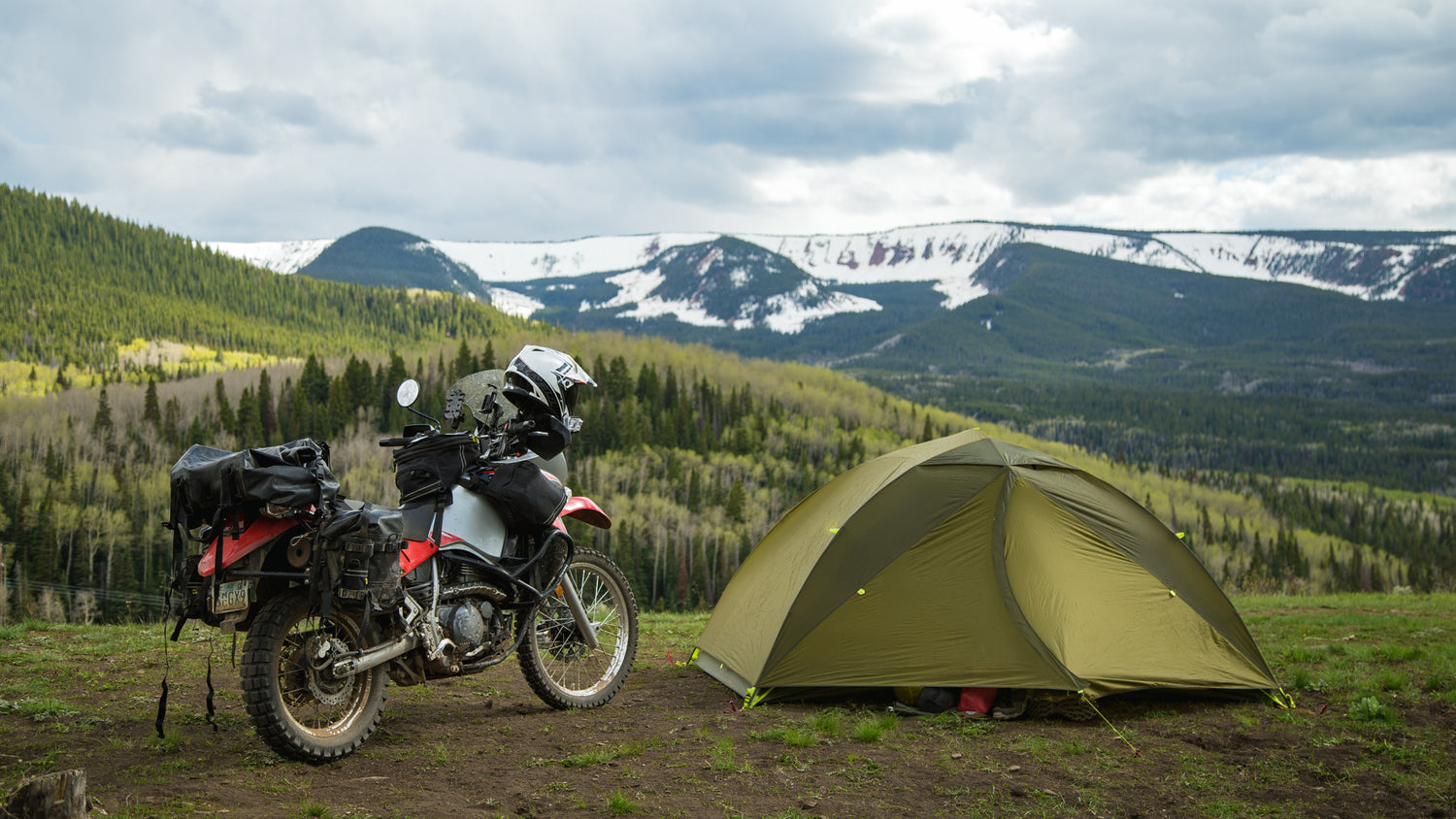 motorcycle camping near tent